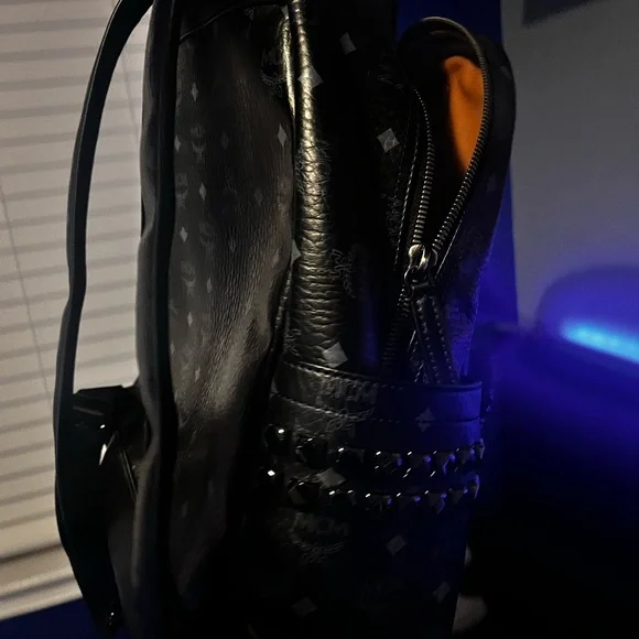 MCM Black Backpack with Studded Design and Durable Material